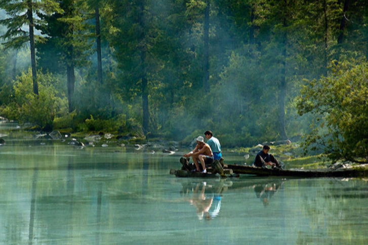 Three Fishermen and a Pond